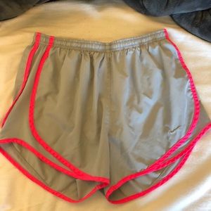 gray and pink nike running shorts